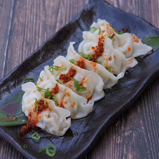 Dumplings with Spicy Garlic Sauce